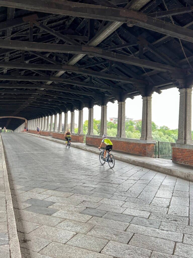 Pavia Ponte Coperto Covered Bridge With Bikers