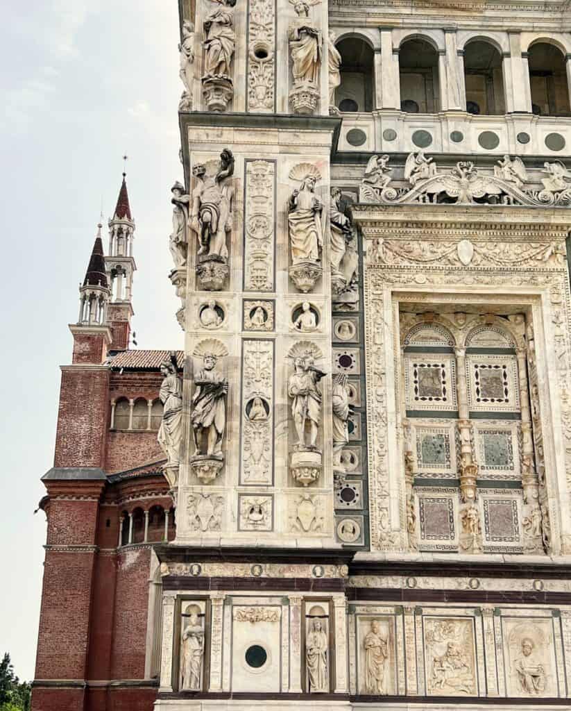 Pavia Certosa Church Exterior Detail Marble Facade With Sculpture Brick Towers In Background Renaissance Architecture