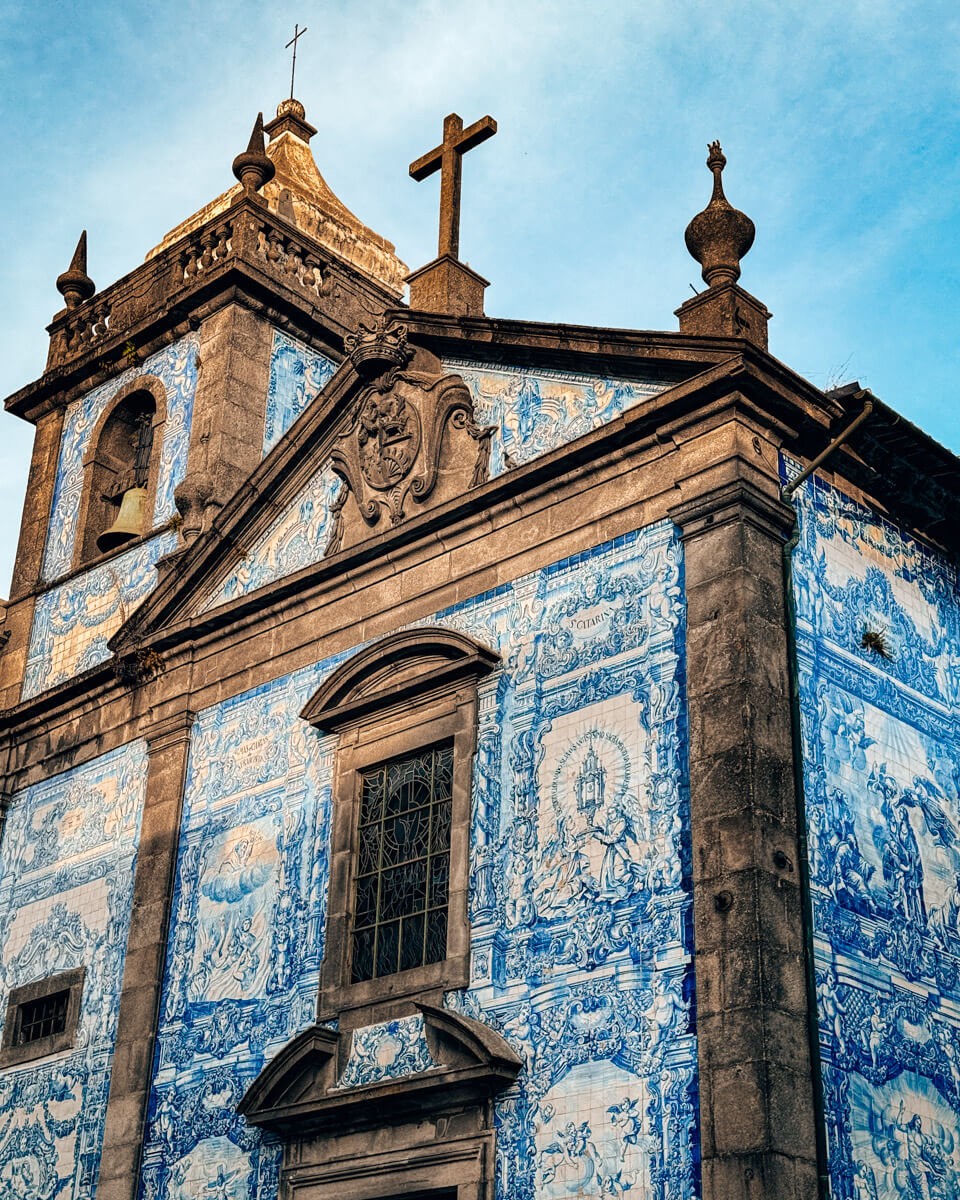 a church covered with blue ceramic tiles in Porto, a typical sight in Porto