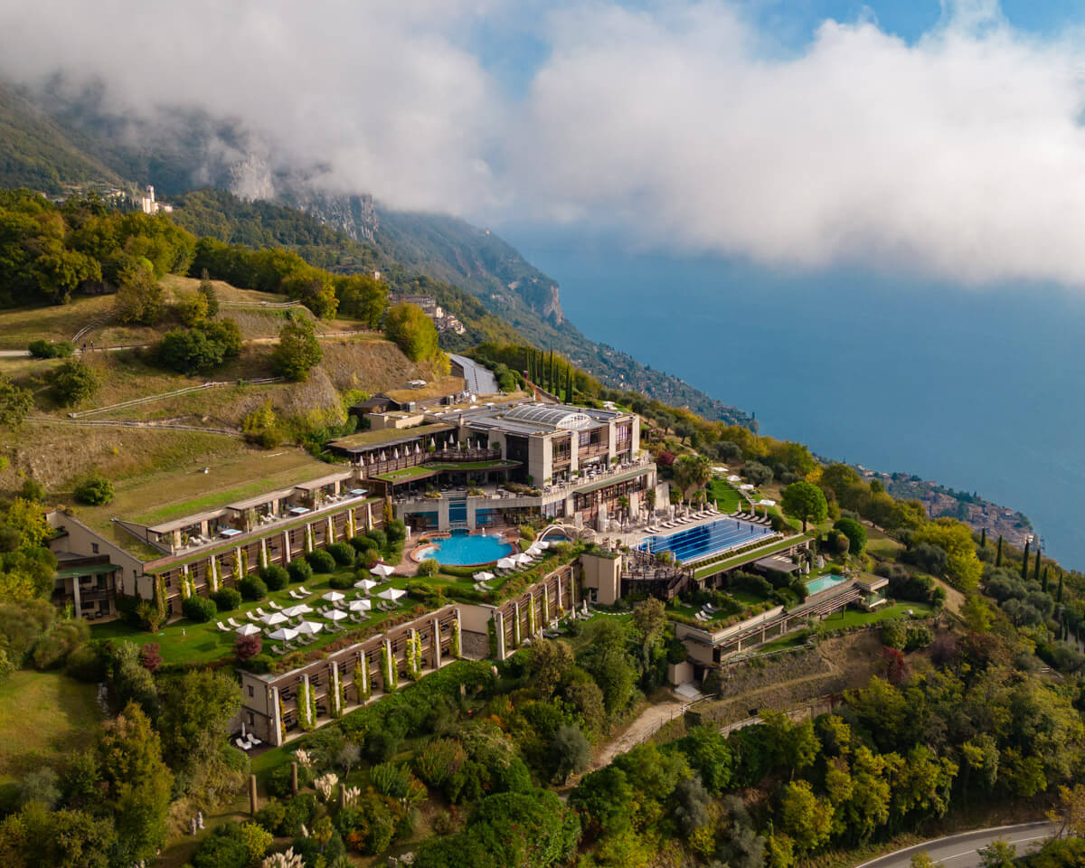 the Lefay Resort & Spa Lago di Garda in Italy nestled in the green mountain,s overlooking the blue lake Garda