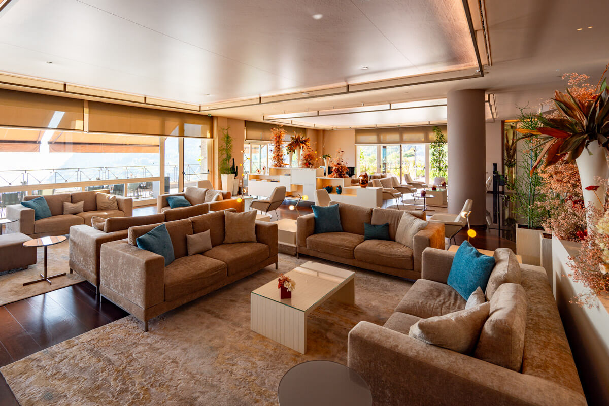 the lobby of the Lefay Resort & Spa Lago di Garda in Italy with cozy sofas