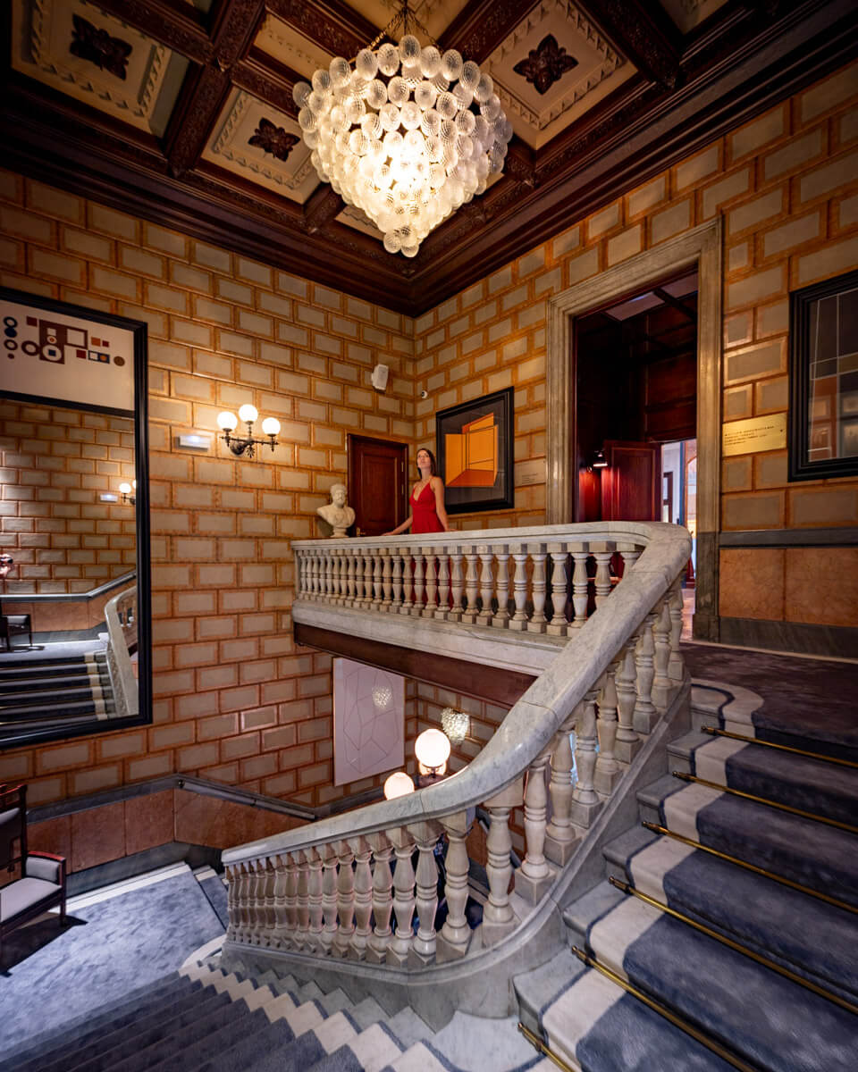 The entrance hall of the Cotton House Hotel in Barcelona, in a 19th century style with a historical and elegant interior