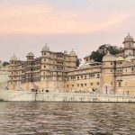 Udaipur Palace Exterior View From Lake Pichola At Sunset Rajasthan Architecture